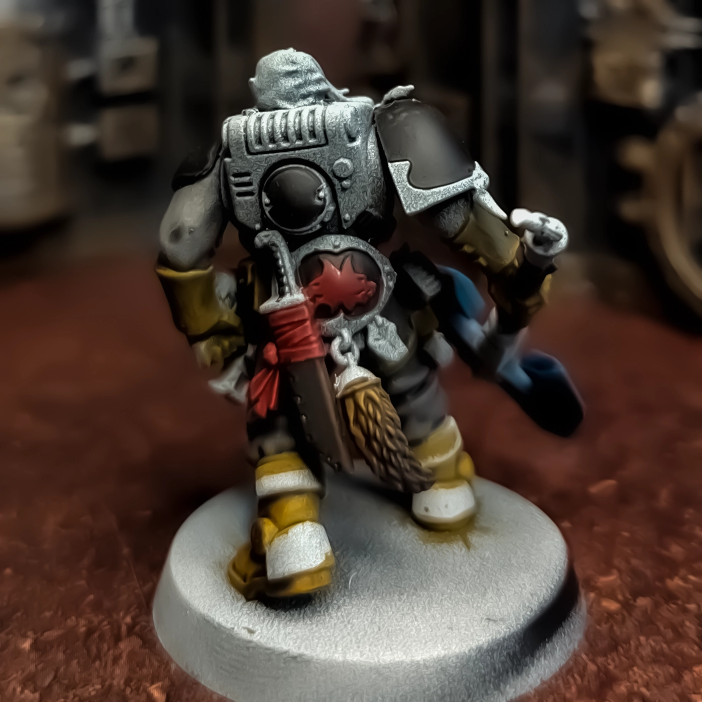 A back view of a Space Marine Scout Model with additional Space Wolf parts.