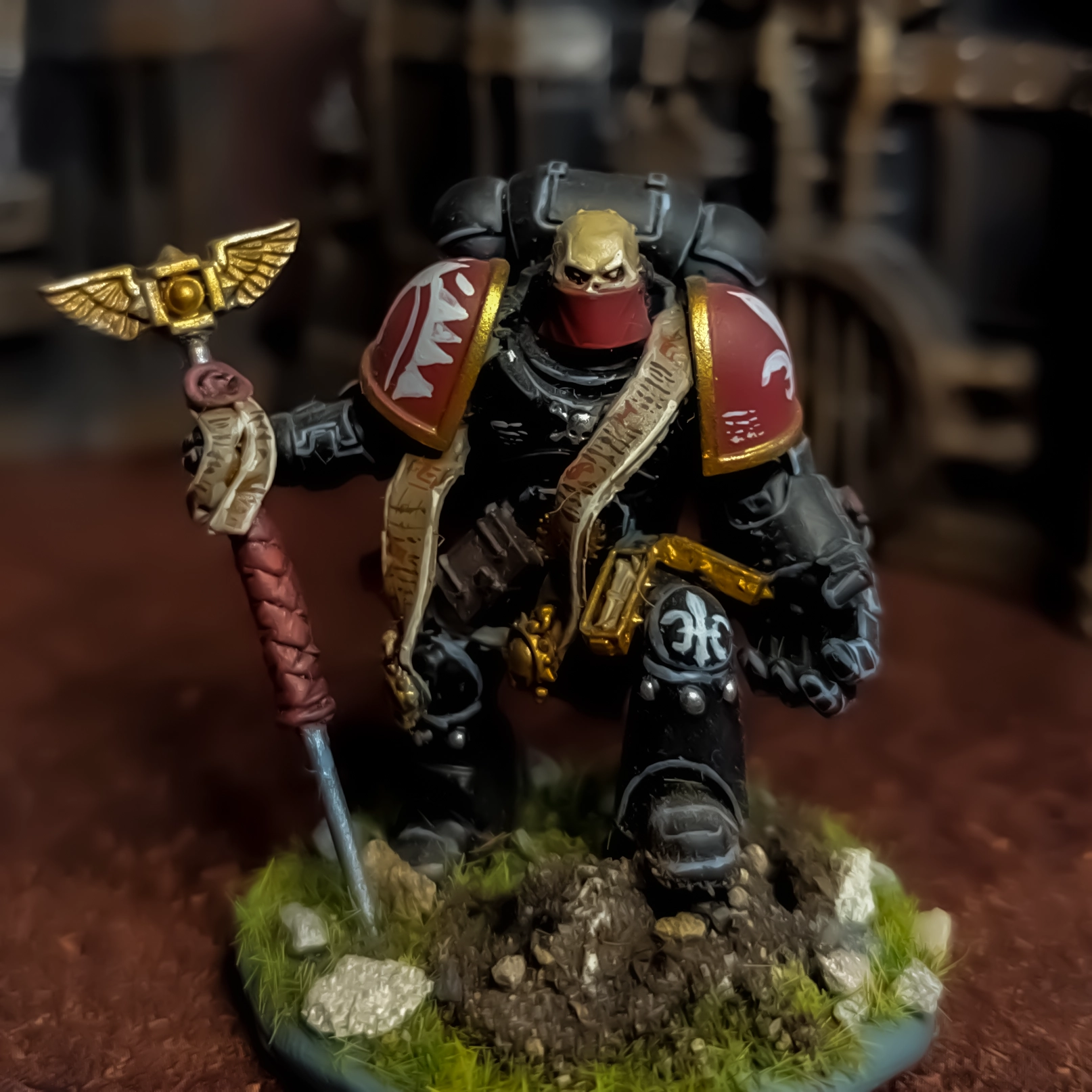 A chaplain using parts from Tactical Space Marines, Greenstuff and the Judiciar head.